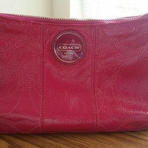 Nearly New Ruby Pink Coach Purse.